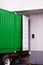 Cargo green container at dock warehouse under loading unloading