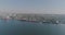 Cargo port with large ships and cranes. Sea port from the air.