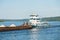 Cargo ship barge loaded with sand