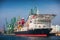 Cargo ship with containers on the harbour. Sea port Varna, Bulgaria