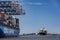 Cargo ship departing wharf at Port Botany, Australia