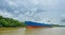 Cargo ship makes its way through waterways of the Panama Canal.