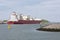 Cargo ship moored in Dutch harbor Rotterdam, biggest seaport Europe