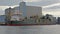 Cargo ship moored in front of silo building in Stavanger