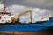 A cargo ship offloading at kingstown, st. vincent