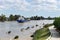 Cargo ship on the river Guadalquivir in its passage through Coria del RÃ­o, Sevilla, AndalucÃ­a, Spain