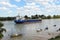 Cargo ship on the river Guadalquivir in its passage through Coria del RÃ­o, Sevilla, AndalucÃ­a, Spain