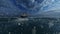 Cargo Ship On Rough Sea Against Blue Sky And Snow