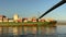 A cargo ship sails to the bridge and carries cargo Maersk Hamburg Stanley Park Vancouver Canada Pacific Ocean Calm on