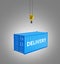 Cargo shipping container in blue with an inscription delivery loading concept the crane lifts the container on grey gradient