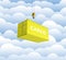 Cargo shipping container in yellow with an inscription delivery loading concept the crane lifts the container on cloud background