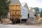 Cargo train car loaded with lumber