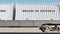 Cargo train and containers with MADE IN SERBIA caption. Railway transportation. 3D rendering
