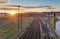 Cargo Train platform at sunset. Railroad