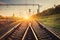 Cargo train platform at sunset. Railroad. Railway station