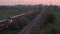 Cargo Train Transportation on Railways, Freight Train Running Towards Station