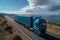Cargo transport Aerial perspective of a semi truck on blue