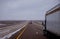 Cargo truck on Arizona desert highway on winter snow covers the highway