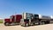 Cargo trucks parked at a rest area in canada