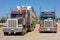 Cargo trucks parked at a rest area in canada