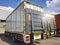 Cargo Trucks the Parking lot at The Warehouse. Slider Lift for Loading Truck. Shipping Cargo Container. Industry Freight Trucks.