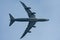 Cargolux airplane soaring in the clear blue sky.