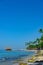 Caribbean beach arbor palm roof path to the sea