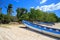 Caribbean Beach in Small Tropical Fishing Village. Clear Waters. Fishing Boats. Summer Day. Blue Skies. Dominican Republic