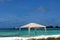 Caribbean beach,tent and yacht
