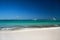 Caribbean coastline with boat in ocean