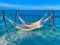 Caribbean Dreams hammocks in the blue sea