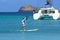 Caribbean fun - young man learning to sail