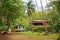 Caribbean house and hut with tropical vegetation