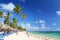 Caribbean resort beach with umbrellas and chairs