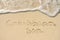 Caribbean Sea Written in Sand on Beach
