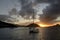 Caribbean sunset with catamarans and sailboats at Soper`s Hole, West End, Tortola, BVI