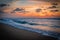 Caribbean sunset and a lonely surfer