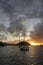 Caribbean sunset with sailboats at Soper`s Hole, West End, Tortola, BVI