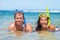 Caribbean vacation beach fun couple on summer holiday swimming with snorkel mask ,ocean watersport activity