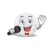 Caricature character of tablet drug happy singing with a microphone