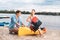 Caring blonde-haired husband telling his woman about kayaking