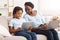 Caring mom providing children`s online privacy protection