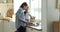 Caring mom and sweet little daughter girl cooking salad