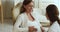 Caring obstetrician-gynecologist express care touch belly of pregnant woman