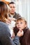 Caring parents giving tablets to son