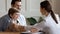 Caring pediatrician cheer little patient in hospital