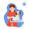 Caring for puppy, pet. Girl dries, combs the dog`s hair.