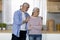 Caring Senior Man Comforting His Offended Wife In Kitchen At Home