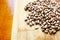 Carioca beans scattered on the cutting board. Brazilian grains