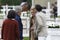 Carlos Torretta kisses Marta Ortega in front of Roberto Torretta and Carmen EchevarrÃ­a